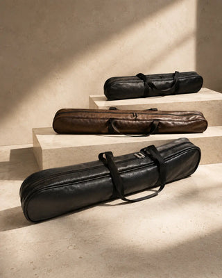 Faux leather travel bag for carrying and storing feather fans