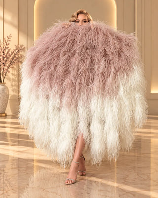 Blush pink and ivory white waterfall boa fans featuring full, fluffy ostrich feathers in a luxury studio setting.