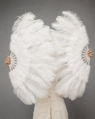 Oversized white ostrich feather fans with full layered plumes, displayed in a clean studio setting by HOT-FANS.