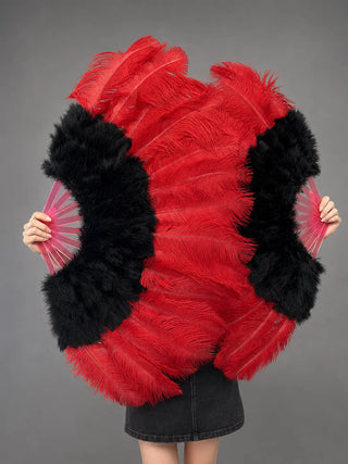 Oversized red ostrich feather fans with black fluffy inner sections and pink staves, displayed in a clean studio setting by HOT-FANS.