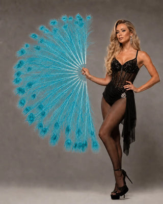 Blue peacock feather fan displayed by a blonde model in a gray studio setting by HOT-FANS